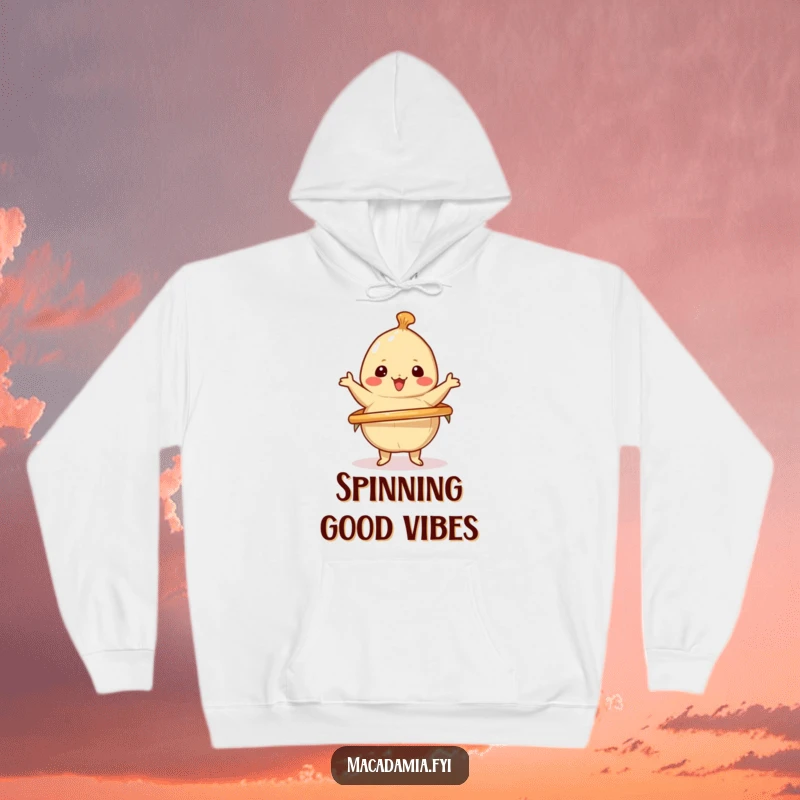 Funny hoodie with a kawaii macadamia nut cheerfully spinning a hula hoop, offering cozy comfort and energetic, playful humor.