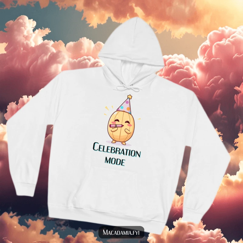 Funny macadamia nut in a party hat blowing a noisemaker on a cozy hoodie, evoking fun, a funny gift.