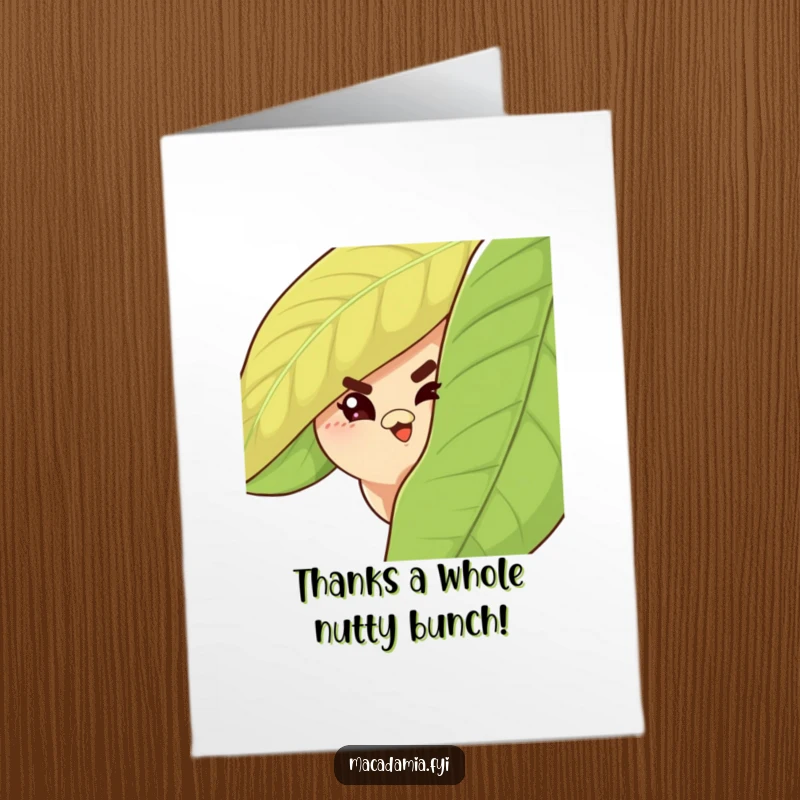 Funny Free Printable Macadamia Nut Thank You Card: A sly nut winking mischievously from behind a large leaf.