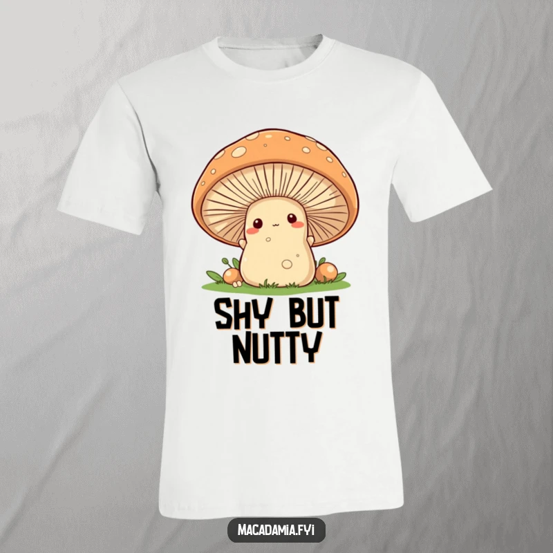 A charming macadamia nut character is hiding and peeking from behind a big, friendly mushroom on a t-shirt.