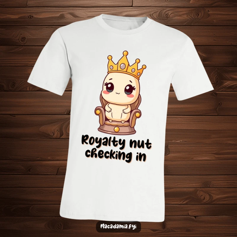 Funny t-shirt showcasing a macadamia nut character proudly wearing a crown on a tiny throne, looking fit for a king.